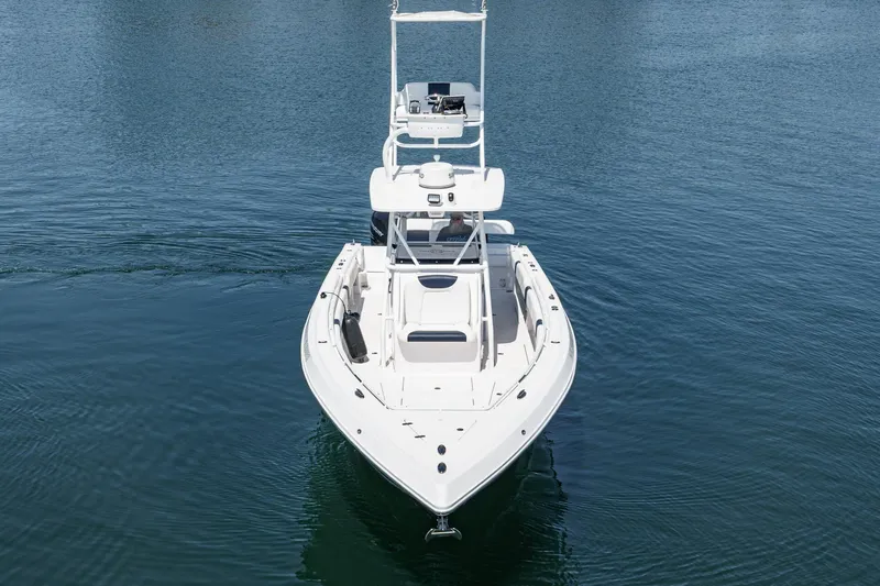 Slide: The Image of 2019 Fountain 38 CC boat on calm water, front view. - 3