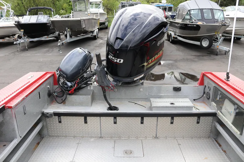 Slide: The Image of 2026 North River SCOUT boat with Yamaha outboard motors in a marina setting. - 14