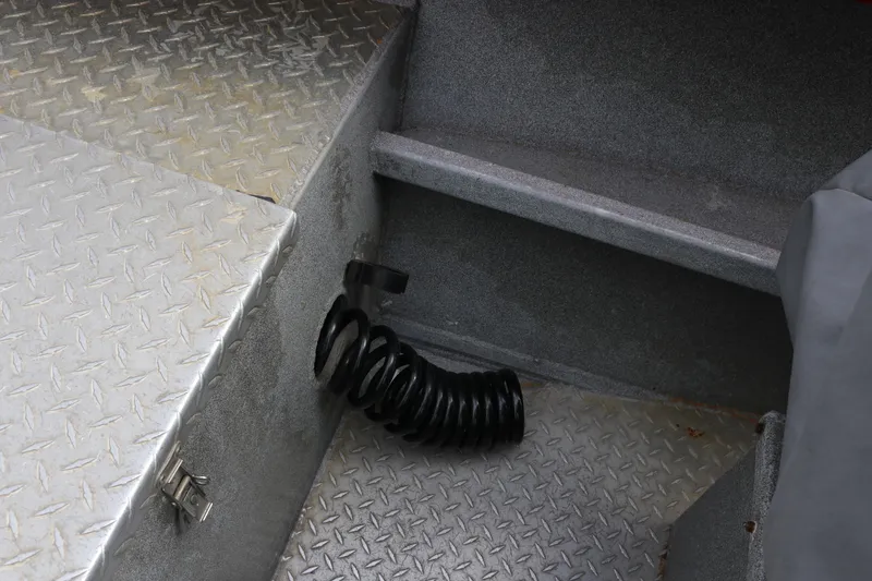 Slide: The Image of Interior of 2026 North River SCOUT boat with diamond plate flooring and coiled hose. - 20