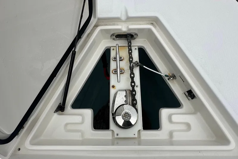Slide: The Image of Anchor locker of 2013 Jupiter 30 Center Console boat with chain and winch. - 5