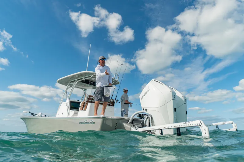 Slide: The Image of 2026 Valhalla Boatworks V-28 Bay on water, featuring anglers and Mercury engines. - 7