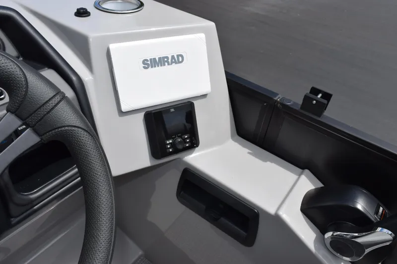 Slide: The Image of 2026 Bentley Pontoons Legacy 223 Navigator dashboard with Simrad navigation system. - 13