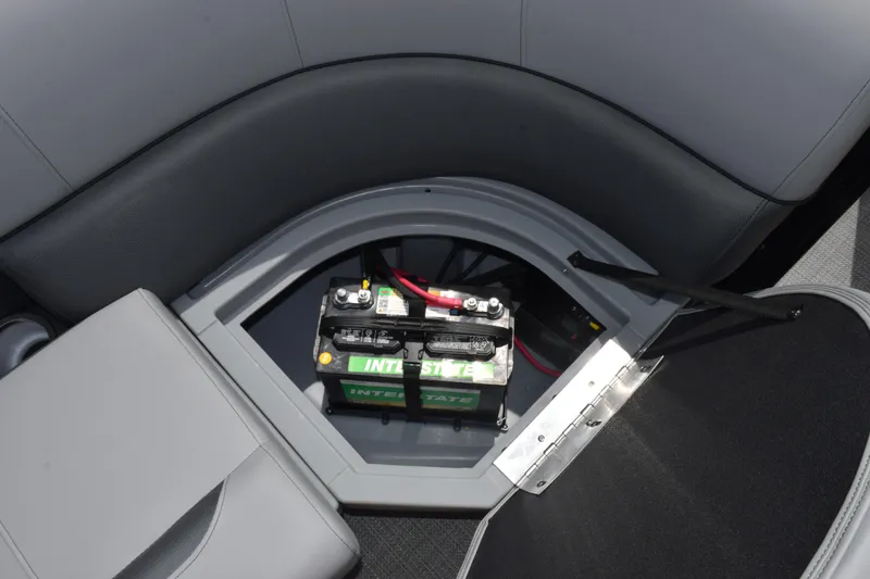 Slide: The Image of Battery compartment of 2026 Bentley Pontoons Legacy 223 Navigator, showcasing storage design. - 17