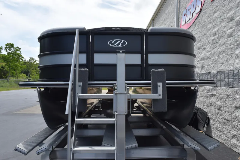 Slide: The Image of 2026 Bentley Pontoons Legacy 223 Navigator on trailer, showcasing sleek design and modern features. - 3