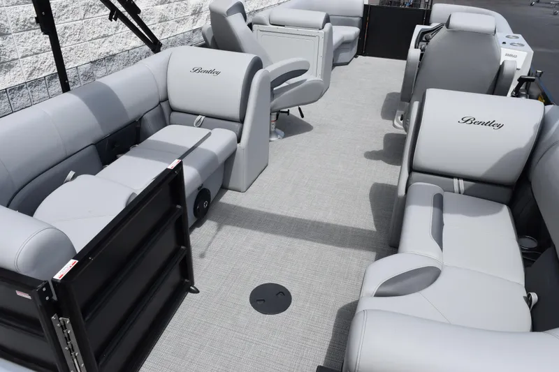 Slide: The Image of 2026 Bentley Pontoons Legacy 223 Navigator interior with luxurious gray seating. - 7