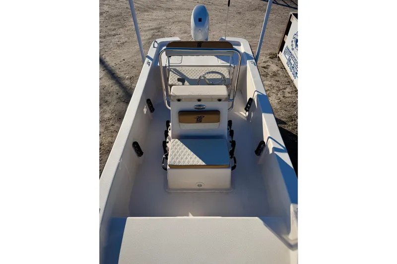 Slide: The Image of 2026 Carolina Skiff E16 JVX CC boat interior with console and seating. - 10