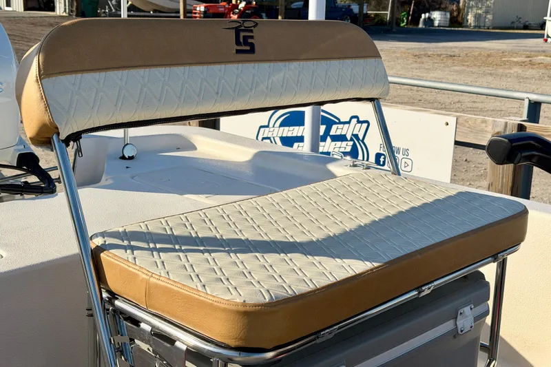 Slide: The Image of 2026 Carolina Skiff E16 JVX CC boat seat with beige and white upholstery. - 5