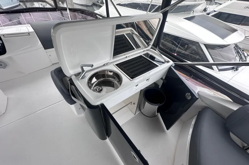 Slide: The Image of Luxury yacht Princess F43 (2018) interior with sink and grill station. - 13