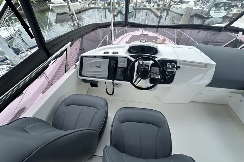 Slide: The Image of Helm of 2018 Princess F43 yacht with Garmin navigation system at marina. - 20