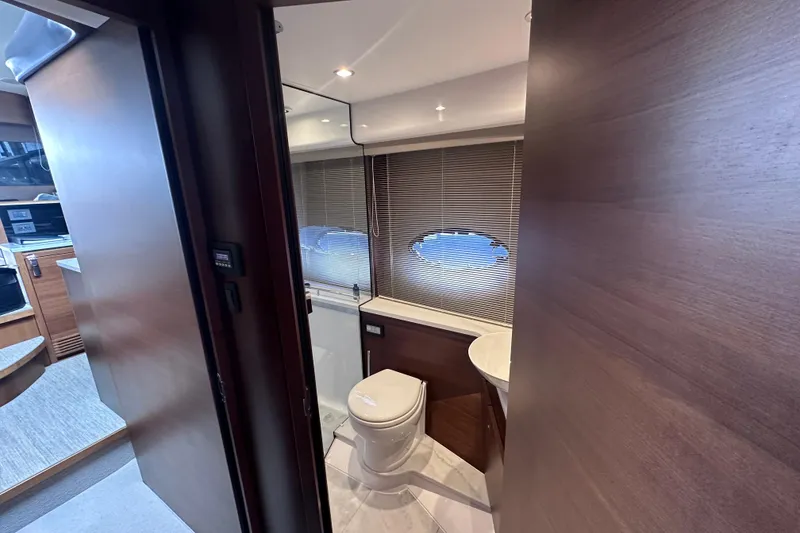 Slide: The Image of Luxurious bathroom interior of 2018 Princess F43 yacht with modern fixtures and wooden accents. - 25