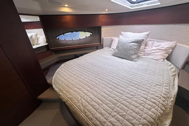 Slide: The Image of Luxurious cabin interior of 2018 Princess F43 yacht with cozy bed and elegant decor. - 26