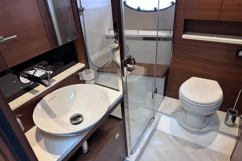 Slide: The Image of Luxurious bathroom in 2018 Princess F43 yacht with modern fixtures and elegant design. - 27