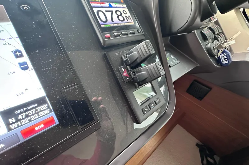 Slide: The Image of Control panel of a 2018 Princess F43 yacht with GPS and navigation displays. - 29