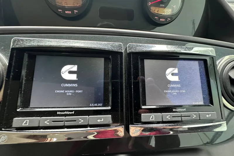 Slide: The Image of Dashboard of a 2018 Princess F43 yacht showing Cummins engine hours on dual displays. - 31