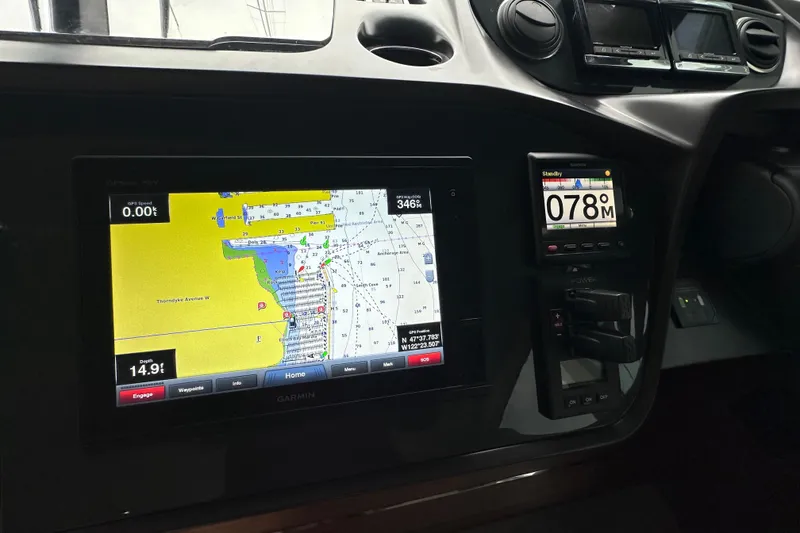 Slide: The Image of Boat navigation system on 2018 Princess F43, featuring Garmin GPS and map display. - 33