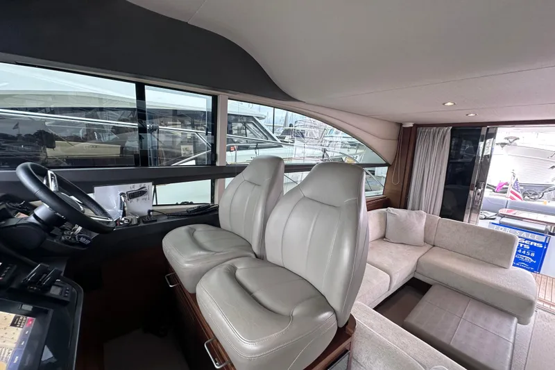 Slide: The Image of Luxurious interior of 2018 Princess F43 yacht with plush seating and modern helm. - 34