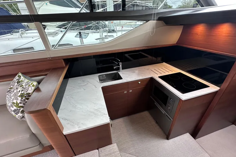 Slide: The Image of Luxurious kitchen interior of 2018 Princess F43 yacht with modern appliances and sleek design. - 4