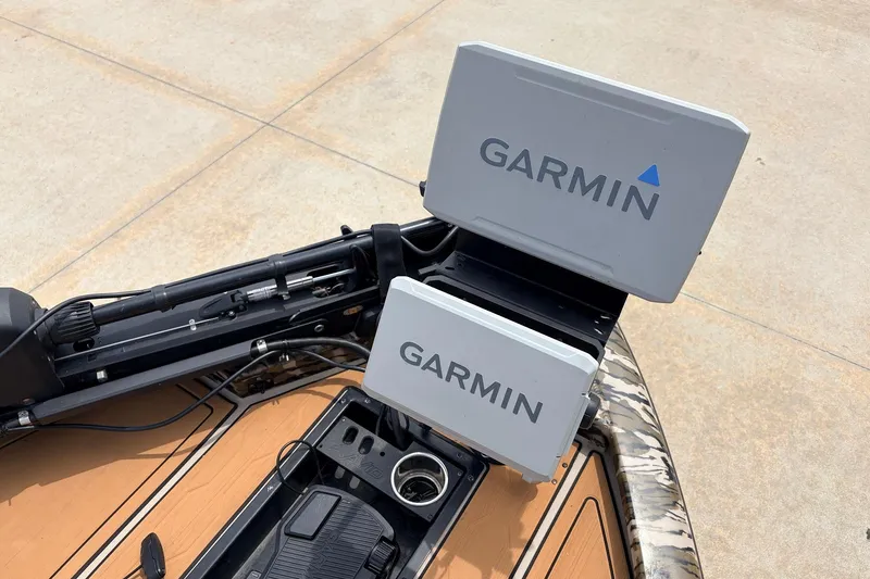 Slide: The Image of 2023 Avid 21 XB Elite boat with dual Garmin navigation systems. - 12