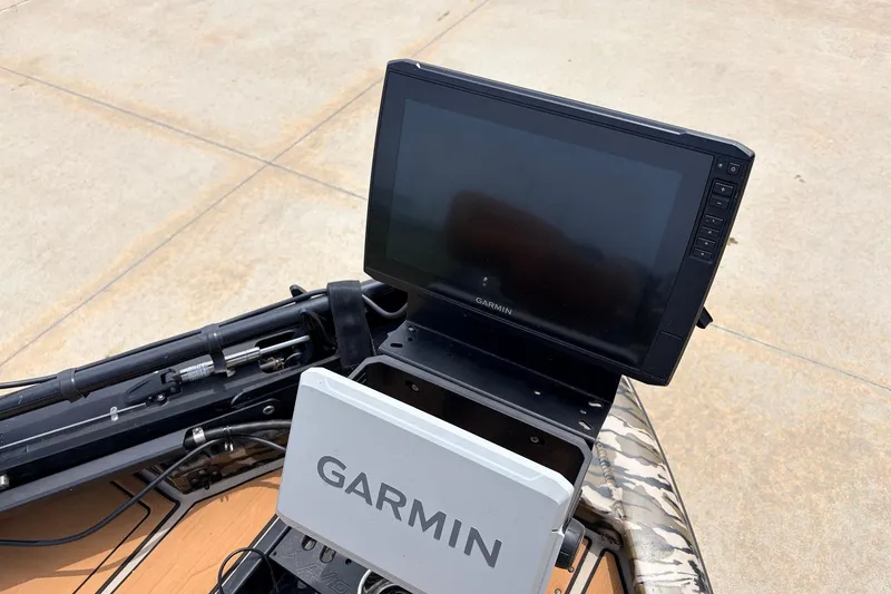 Slide: The Image of Garmin display on 2023 Avid 21 XB Elite boat, showcasing advanced navigation technology. - 13