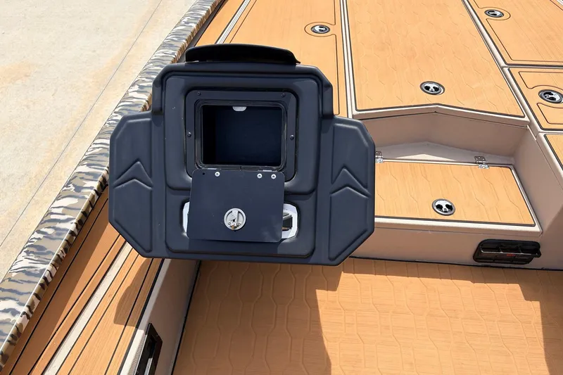 Slide: The Image of 2023 Avid 21 XB Elite boat deck with storage compartment and sleek design. - 33