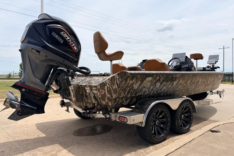 Slide: The Image of 2023 Avid 21 XB Elite boat with Yamaha engine on a trailer. - 5
