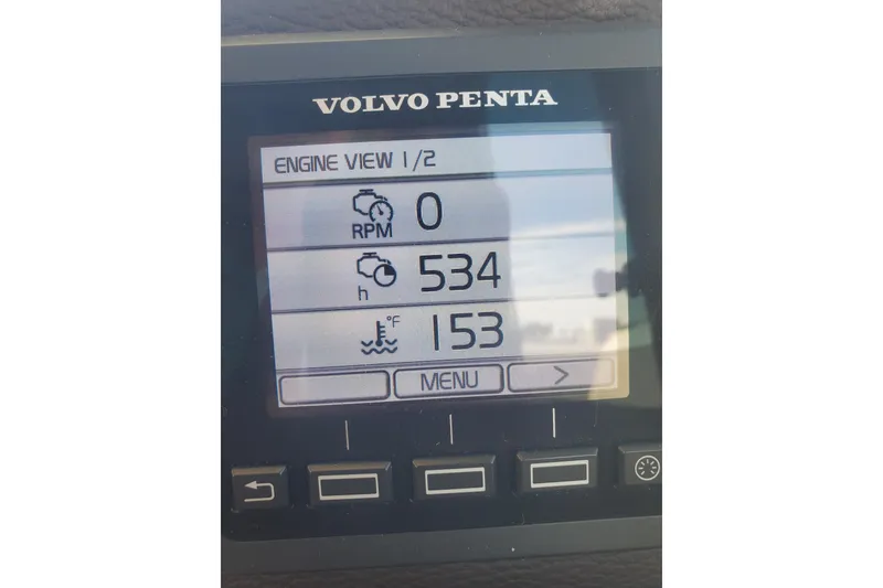 Slide: The Image of Volvo Penta engine display on 2016 Cutwater 28, showing RPM, hours, and temperature. - 12