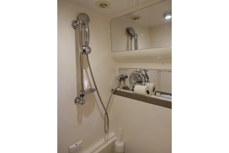 Slide: The Image of Bathroom interior of 2009 Regal Commodore 4460 yacht with shower and mirror. - 15