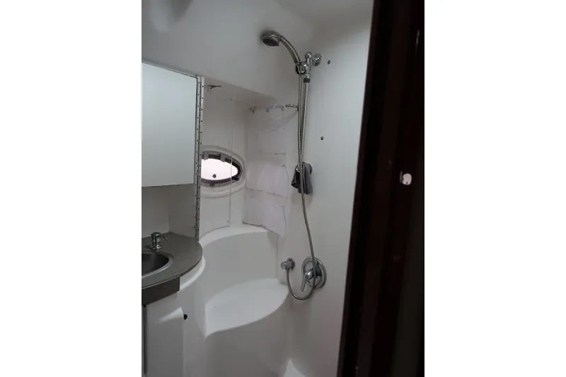 Slide: The Image of Bathroom interior of 2009 Regal Commodore 4460 yacht with shower and sink. - 18