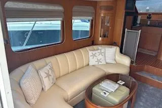 Slide: The Image of Luxurious interior of 2006 Ocean Alexander 48 Sedan yacht with elegant seating and decor. - 12