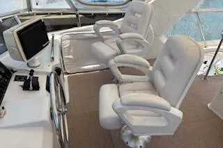 Slide: The Image of Luxury helm seating on 2006 Ocean Alexander 48 Sedan yacht. - 2