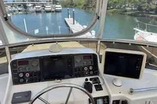 Slide: The Image of Cockpit view of 2006 Ocean Alexander 48 Sedan yacht with navigation equipment. - 3