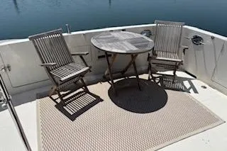 Slide: The Image of Outdoor seating on 2006 Ocean Alexander 48 Sedan yacht deck. - 6