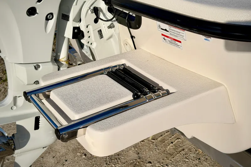 Slide: The Image of 2026 Carolina Skiff E16 JVX CC boat ladder detail, showcasing sturdy construction. - 5