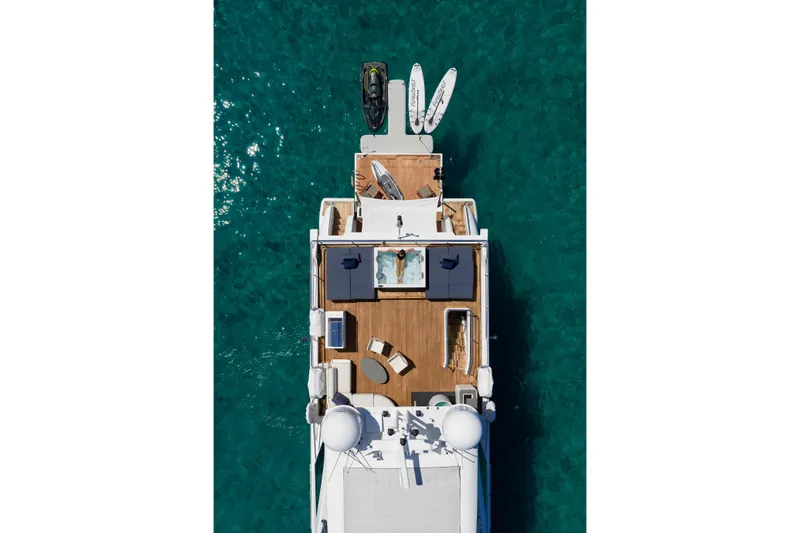 Slide: The Image of Aerial view of 2023 Azimut Grande 32M yacht with deck and watercraft. - 2