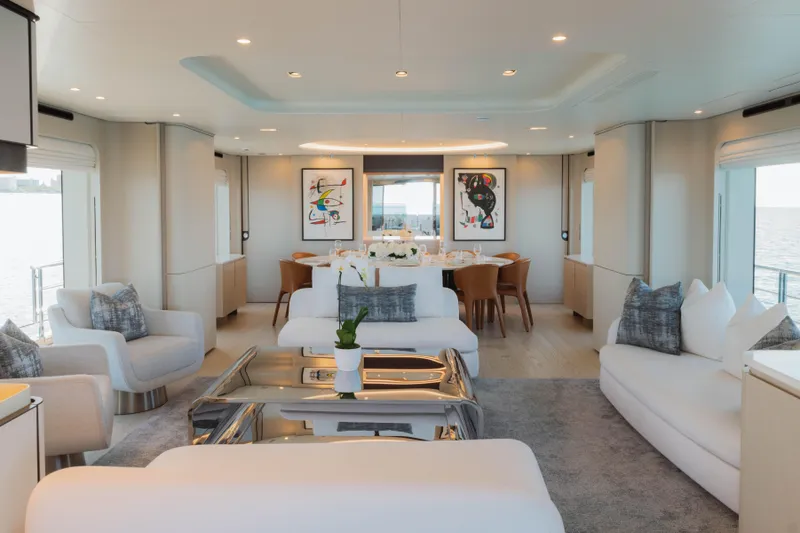 Slide: The Image of Luxurious interior of 2023 Azimut Grande 32M yacht with elegant seating and dining area. - 20