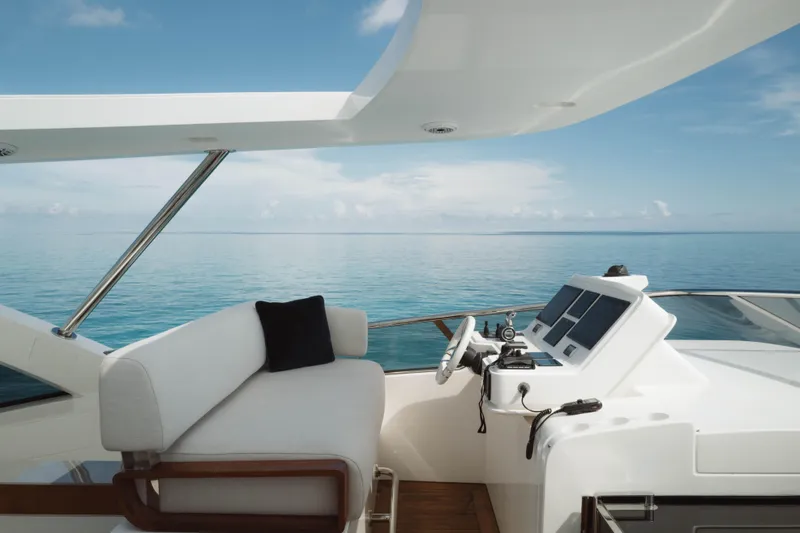 Slide: The Image of Luxurious 2023 Azimut Grande 32M yacht helm with ocean view. - 26