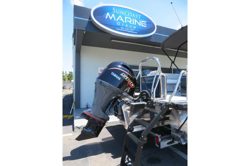 Slide: The Image of 2026 Avalon Venture 85 Quad Lounge boat with Yamaha engine at Suncoast Marine Group. - 15