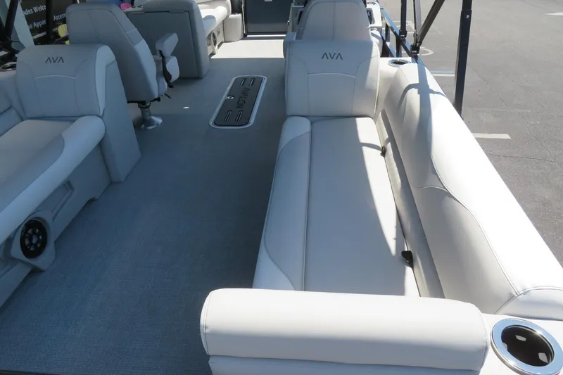 Slide: The Image of Luxurious interior of 2026 Avalon Venture 85 Quad Lounge pontoon boat with plush seating. - 18