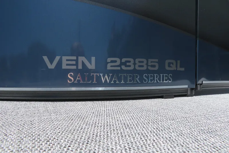 Slide: The Image of 2026 Avalon Venture 85 Quad Lounge, Saltwater Series, VEN 2385 QL branding detail. - 3