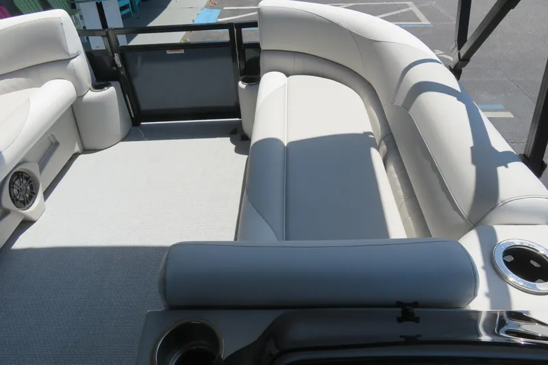 Slide: The Image of 2026 Avalon Venture 85 Quad Lounge interior with plush seating and cup holders. - 36