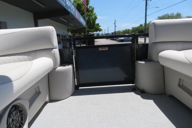 Slide: The Image of Interior view of 2026 Avalon Venture 85 Quad Lounge boat, showcasing comfortable seating and sleek design. - 38