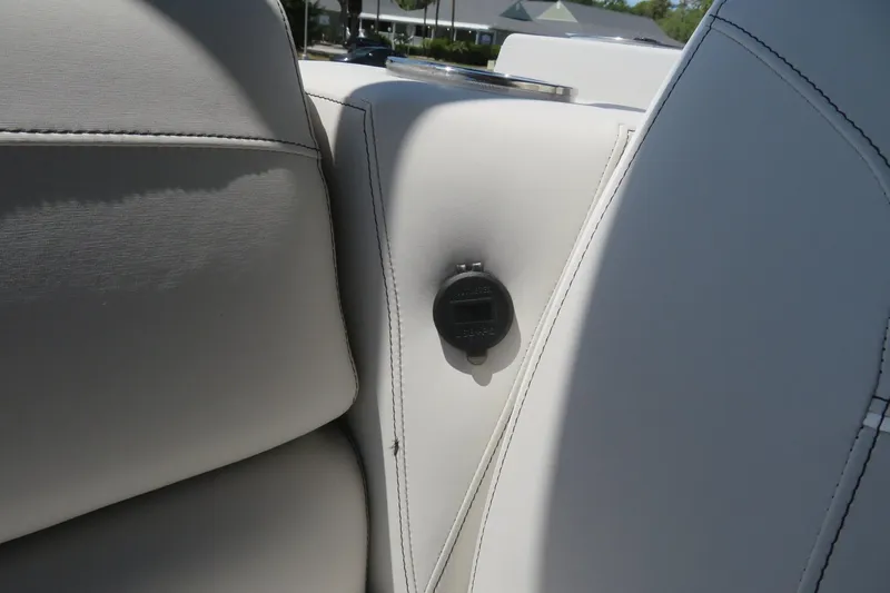 Slide: The Image of Close-up of Avalon Venture 85 Quad Lounge 2026 boat's white leather seating detail. - 44