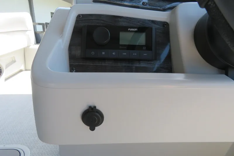 Slide: The Image of Control panel of 2026 Avalon Venture 85 Quad Lounge boat with Fusion audio system. - 45