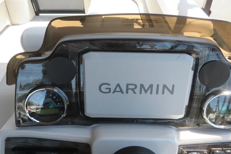 Slide: The Image of Dashboard of 2026 Avalon Venture 85 Quad Lounge with Garmin display and gauges. - 47