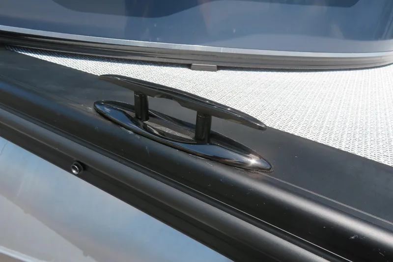 Slide: The Image of Close-up of a cleat on the 2026 Avalon Venture 85 Quad Lounge boat. - 5