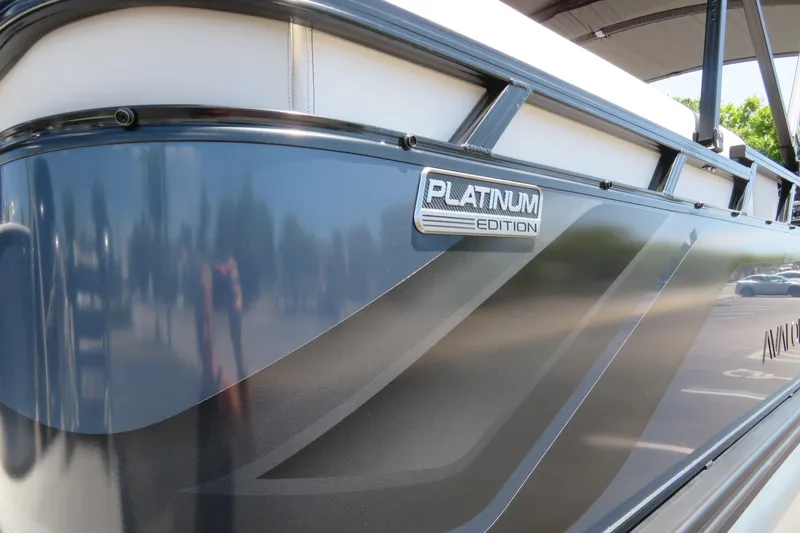 Slide: The Image of 2026 Avalon Venture 85 Quad Lounge, Platinum Edition, sleek design with reflective finish. - 7