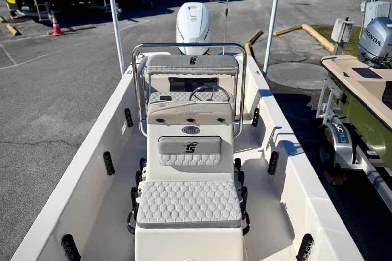 Slide: The Image of 2026 Carolina Skiff E20 JVX CC boat interior with steering console and seating. - 10