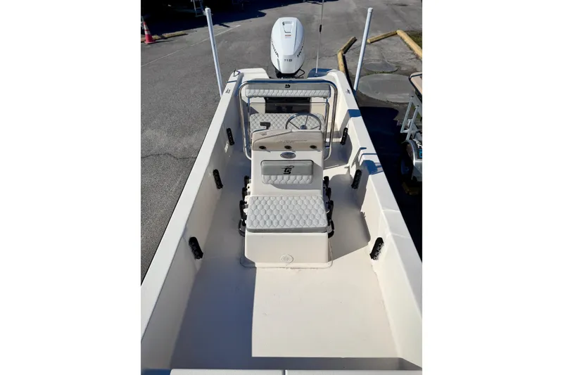 Slide: The Image of 2026 Carolina Skiff E20 JVX CC boat interior with center console and seating. - 11