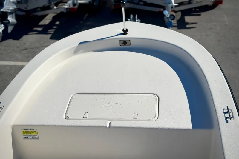 Slide: The Image of 2026 Carolina Skiff E20 JVX CC boat deck with storage compartment. - 6