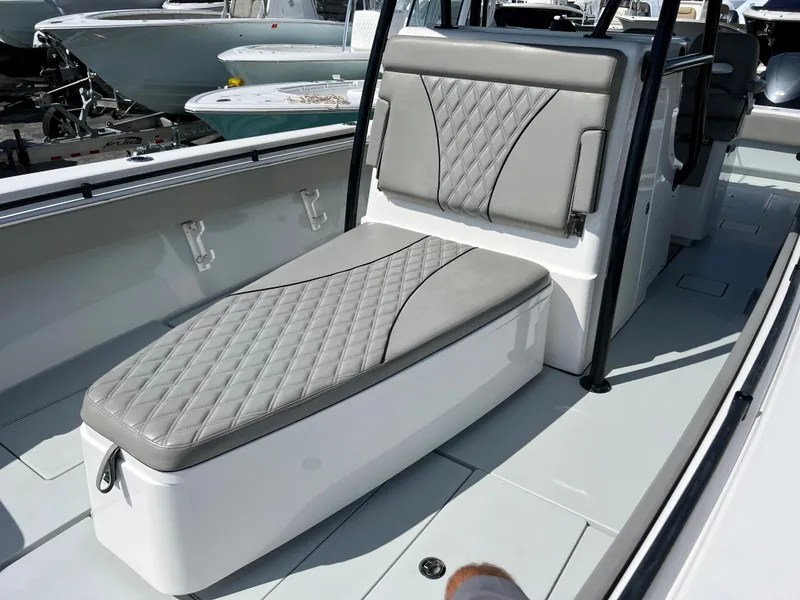 Slide: The Image of 2018 Contender 39 ST boat with gray upholstery and modern design. - 13